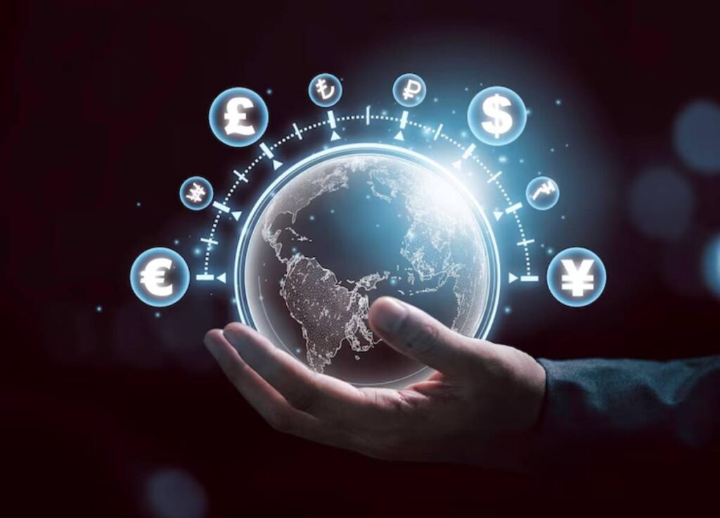 A hand holds a glowing globe surrounded by various currency symbols, representing global finance and economic connectivity.