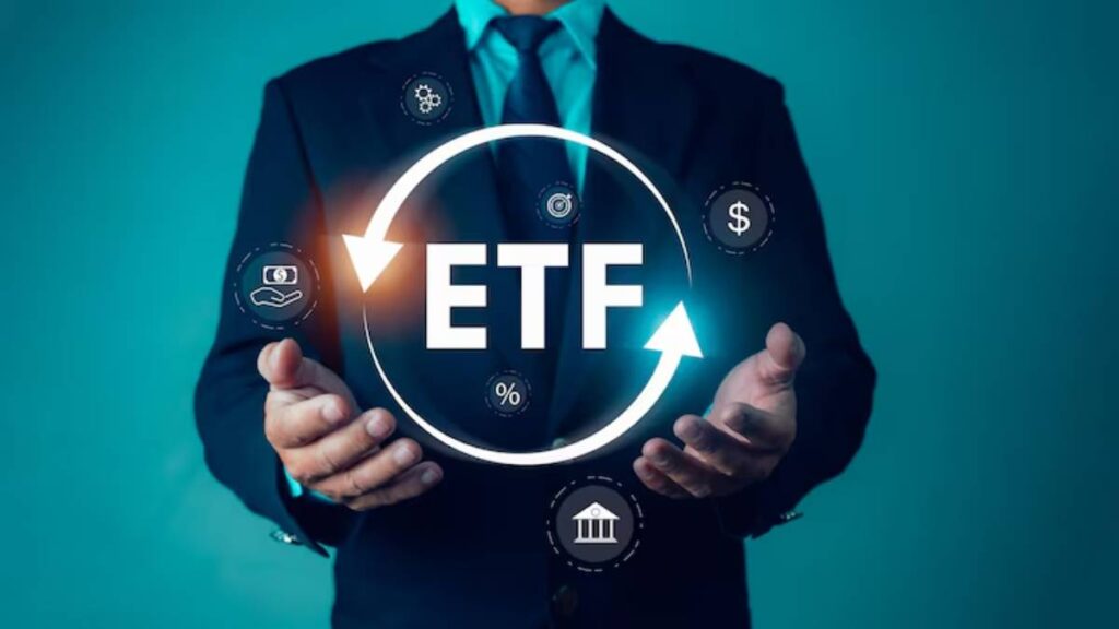 A businessman in a suit presents the acronym ETF,surrounded by financial icons indicating investment and growth concepts.